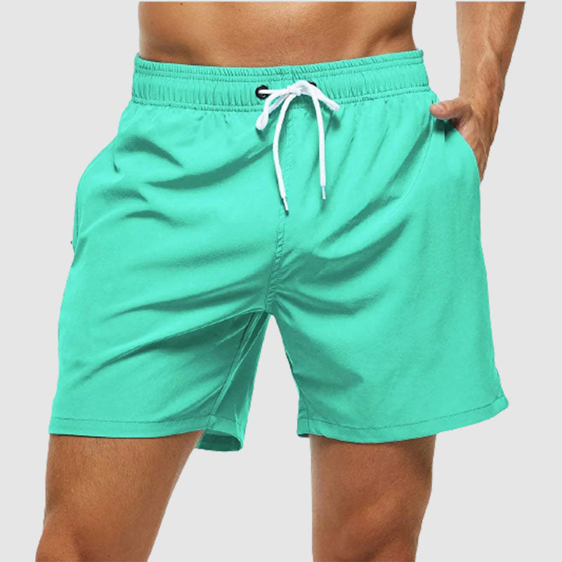 Men's Solid Color Quarter Casual Beach Shorts With Zippered Pockets And Mesh Lining Swimwear